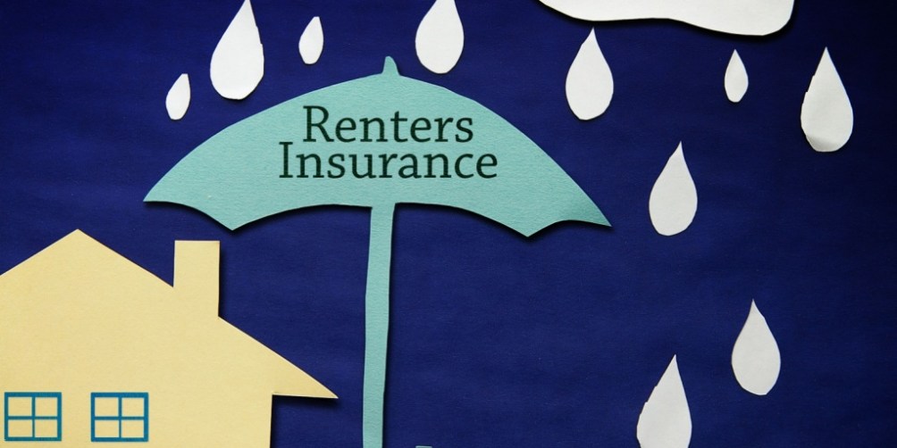 Paper cutout illustration showing an umbrella labeled "Renters Insurance" sheltering a house from falling raindrops, visually highlighting how renters insurance coverage has many lesser-known benefits.