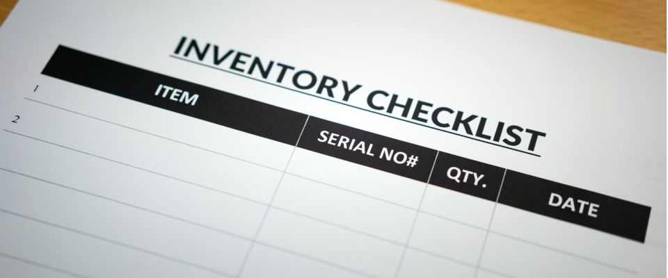 Close-up of a blank inventory checklist used to document valuables, an essential step when securing high-value item coverage.