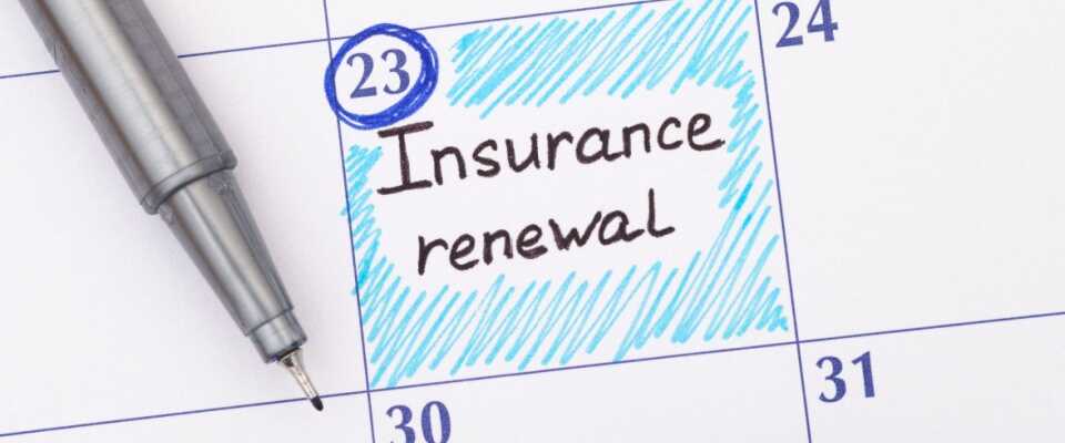 Close-up of a calendar page with the 23rd circled in blue and the words "insurance renewal" handwritten, highlighting the role of the effective date in insurance policy renewals and coverage timelines.